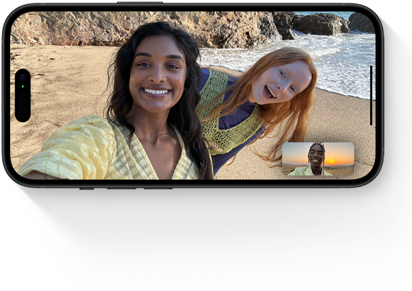 Photo montrant une conversation FaceTime entre trois personnes sur une plage