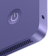 iMac, vue arrière, couleur mauve, fonctionnalités : bouton d’alimentation, prise casque et grille des haut-parleurs