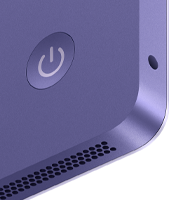 iMac, vue arrière, couleur mauve, fonctionnalités : bouton d’alimentation, prise casque et grille des haut-parleurs